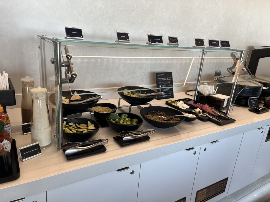 π« Tucked away in BOS Terminal B, the Admirals Club offers solid comfort, snacks, and runway views βοΈ. Not the flashiest, but a welcome break before your next hop. Worth it with a day pass or Oneworld status? You decide. π