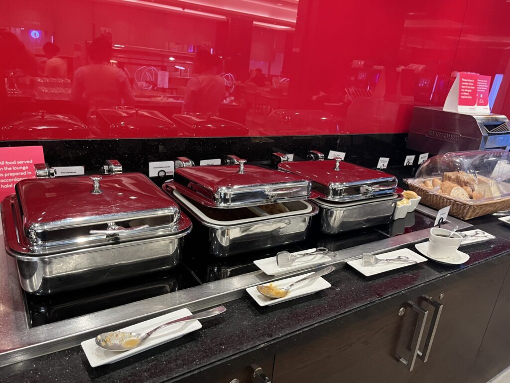 Neil Scrivener and Flying Business review the Marhaba Lounge in Dubai's (DXB) Terminal 1/Concourse D. Access includes Priority Pass members.