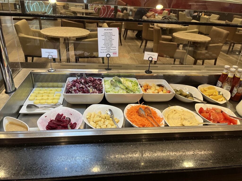 Neil Scrivener and Flying Business review the Marhaba Lounge in Dubai's (DXB) Terminal 1/Concourse D. Access includes Priority Pass members.