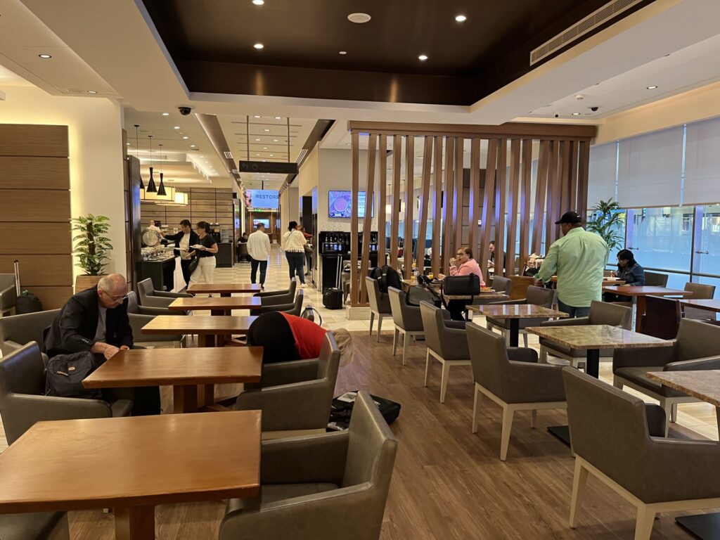 Neil Scrivener and Flying Business review the Ahlan Lounge in Dubai's (DXB) Terminal 1/Concourse D. Access includes Priority Pass members.